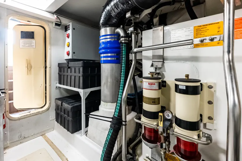 Slide: The Image of Engine room of 2017 Azimut Fly 72 yacht with equipment and storage. - 92