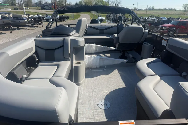 Slide: The Image of 2026 Trifecta 22ULCS pontoon boat interior with plush seating and modern design. - 10