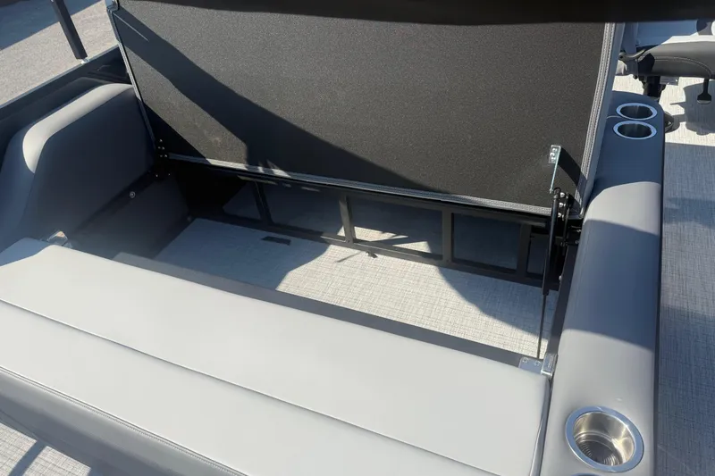Slide: The Image of 2026 Trifecta 22ULCS boat interior with gray seating and cup holders. - 17