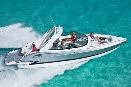 Slide: The Image of Manufacturer Provided Image: 2015 Formula 310 Bowrider cruising on clear turquoise water. - 4