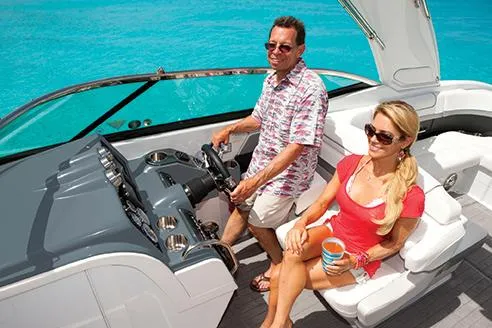 Slide: The Image of Manufacturer Provided Image: Couple enjoying a ride on a 2015 Formula 310 Bowrider boat. - 7
