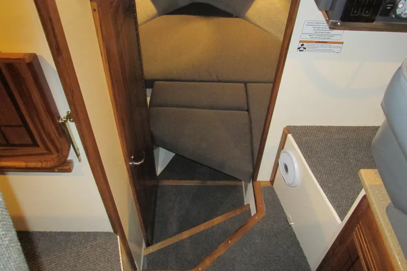 Slide: The Image of Interior cabin view of 2026 Seaport Commander 2800 boat with cozy seating area. - 20