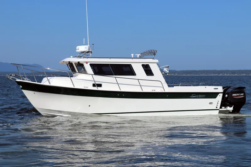 Slide: The Image of 2026 Seaport Commander 2800 boat cruising on open water. - 4