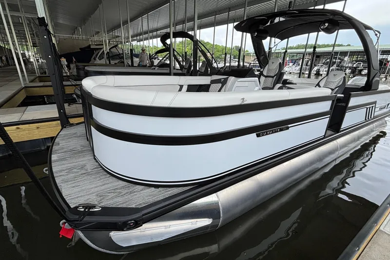 The Image of 2026 Viaggio D26U pontoon boat docked in a marina, featuring sleek design and modern seating. - 0