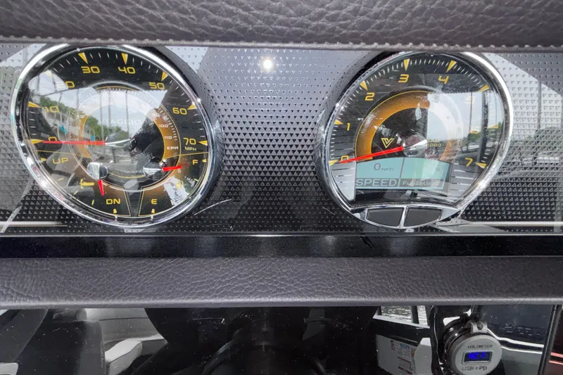 Slide: The Image of Dashboard of a 2026 Viaggio D26U with speedometer and tachometer gauges. - 24