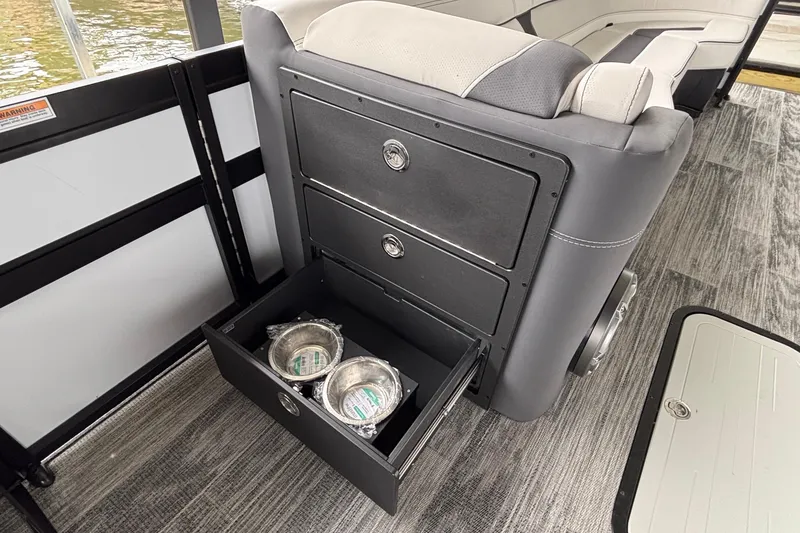 Slide: The Image of 2026 Viaggio D26U boat interior with open storage drawer and seating. - 36
