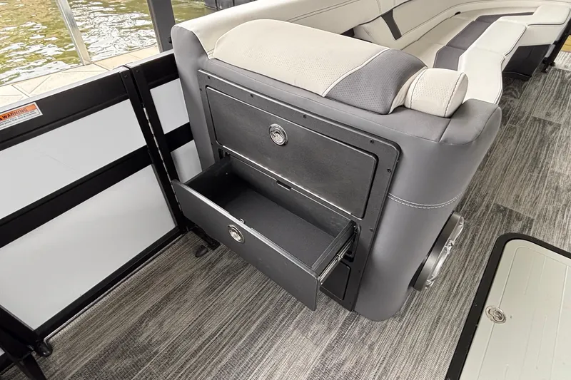 Slide: The Image of Interior of Viaggio D26U 2026 boat with open storage drawer and seating. - 37