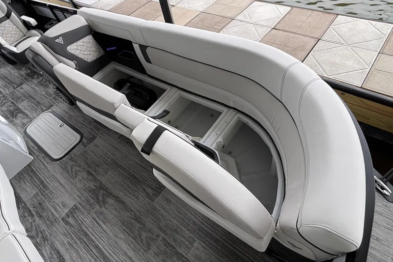 Slide: The Image of Luxurious seating on 2026 Viaggio D26U boat with storage compartment open. - 40