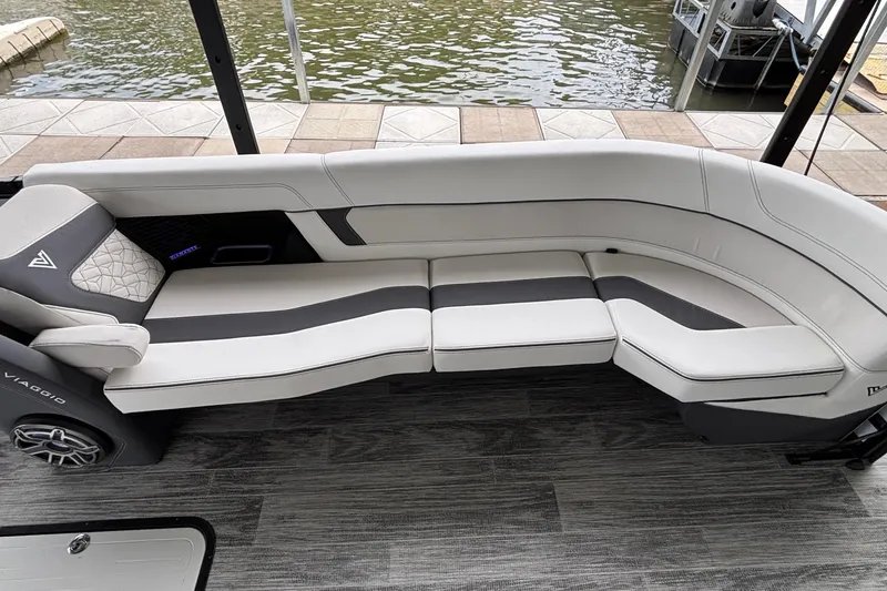 Slide: The Image of Luxurious seating on 2026 Viaggio D26U boat, docked by the water. - 41