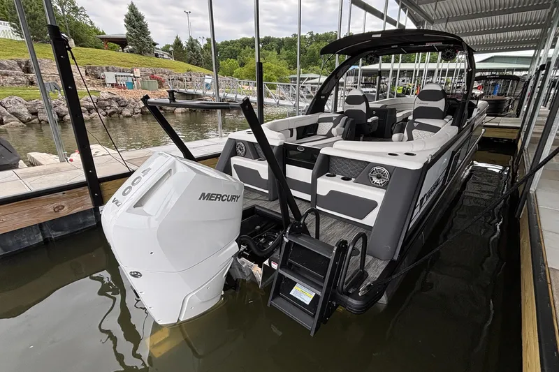Slide: The Image of 2026 Viaggio D26U boat docked with Mercury outboard motor, featuring sleek design and spacious seating. - 46