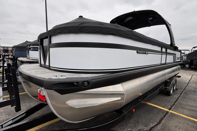 Slide: The Image of 2026 Viaggio D26U pontoon boat with sleek design on a trailer in a parking lot. - 8