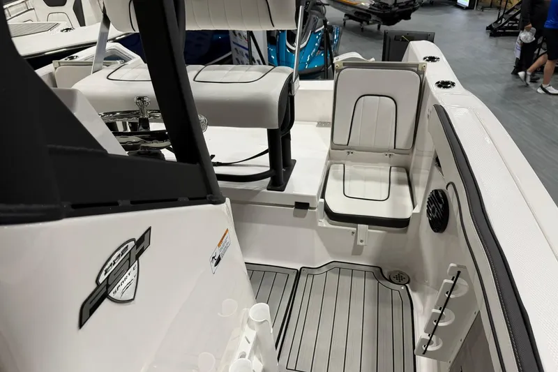Slide: The Image of 2025 Yamaha Boats 222 FSH Sport E interior with seating and deck details. - 21