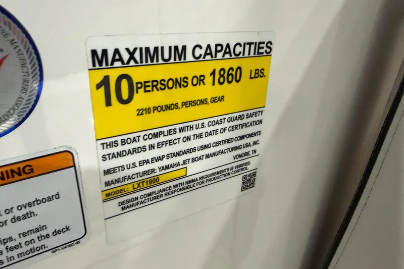 Slide: The Image of 2025 Yamaha Boats 222 FSH Sport E capacity label, 10 persons or 1860 lbs. - 24