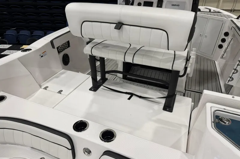 Slide: The Image of 2025 Yamaha Boats 222 FSH Sport E interior with white seating and modern design. - 6