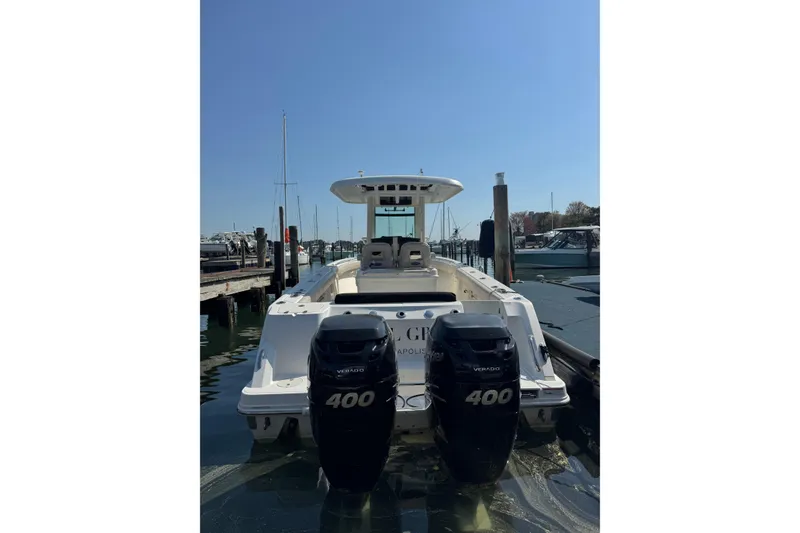 Slide: The Image of 2020 Boston Whaler 280 Outrage boat docked with dual 400 Verado engines. - 8