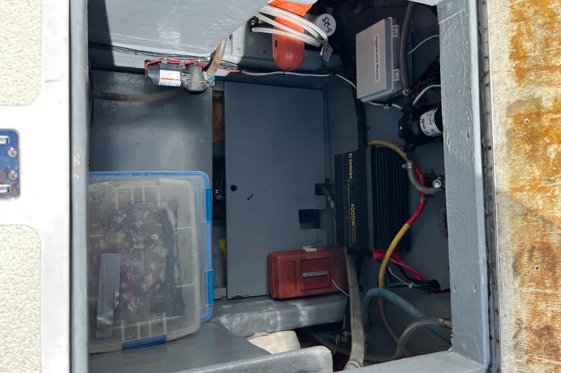 Slide: The Image of Open storage compartment on a 1971 Pacifica 44 Convertible boat deck. - 23