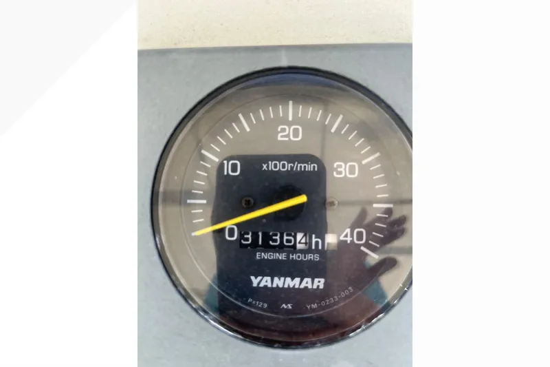 Slide: The Image of Yanmar engine hour meter showing 3136 hours on a 1971 Pacifica 44 Convertible. - 28