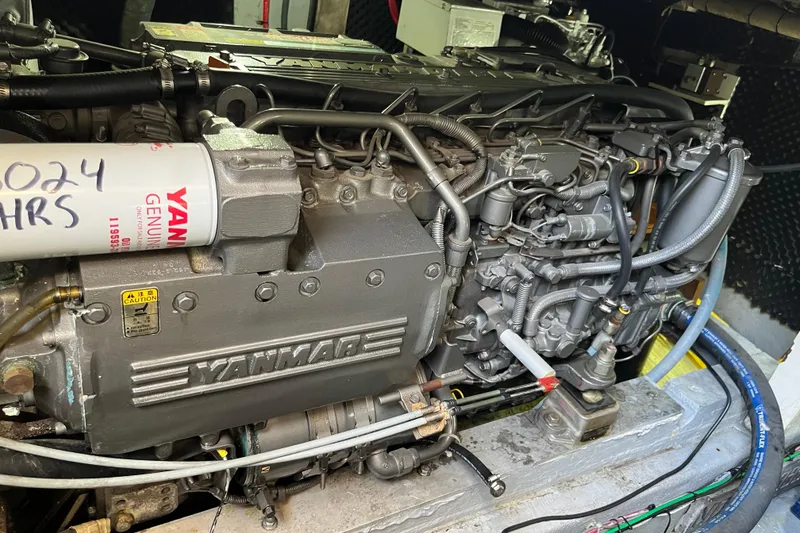 Slide: The Image of Engine compartment of a 1971 Pacifica 44 Convertible boat, showcasing mechanical components. - 54