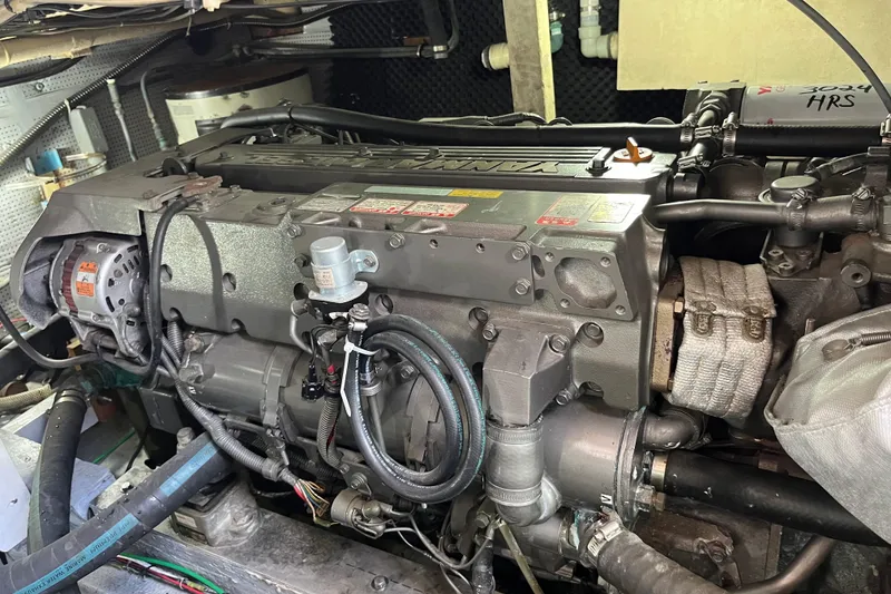 Slide: The Image of Engine of a 1971 Pacifica 44 Convertible boat, showcasing intricate mechanical components. - 56