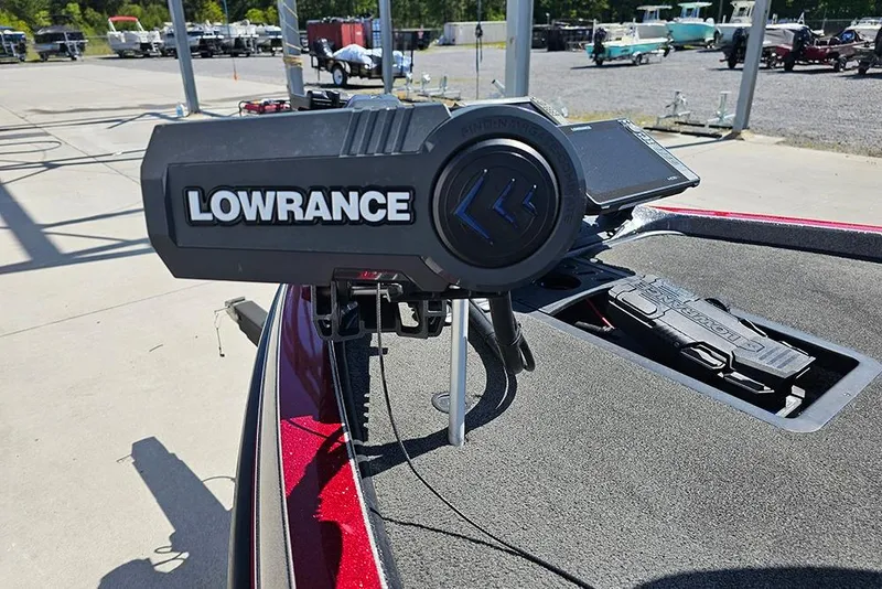 Slide: The Image of Lowrance fishfinder on 2015 Ranger Z521 Comanche boat, parked outdoors. - 12