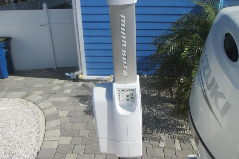 Slide: The Image of Minn Kota Talon anchor system on Grady-White Adventure 208, 1998 model, near Suzuki engine. - 10