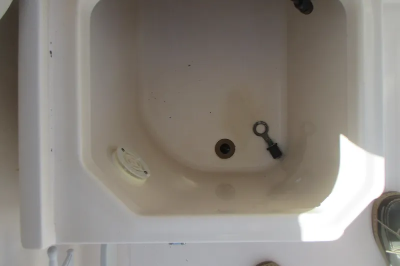 Slide: The Image of Boat sink with plug, Grady-White Adventure 208, 1998 model. - 21