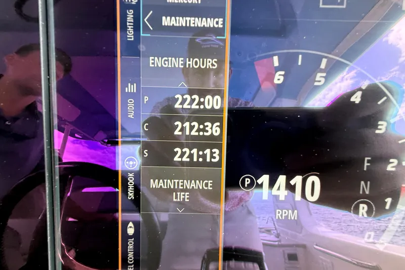 Slide: The Image of Dashboard of a 2025 Boston Whaler 350 Realm showing engine hours and RPM. - 43
