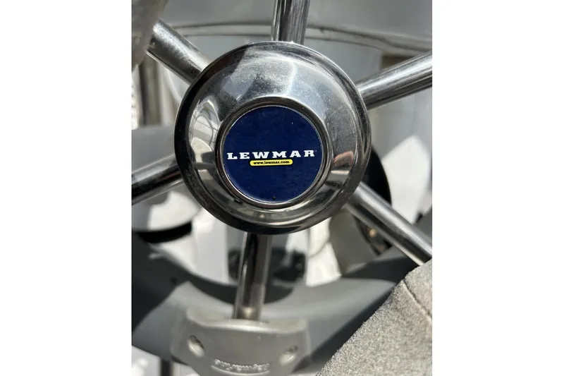 Slide: The Image of Steering wheel of 2014 Hunter e33 sailboat with Lewmar logo. - 13