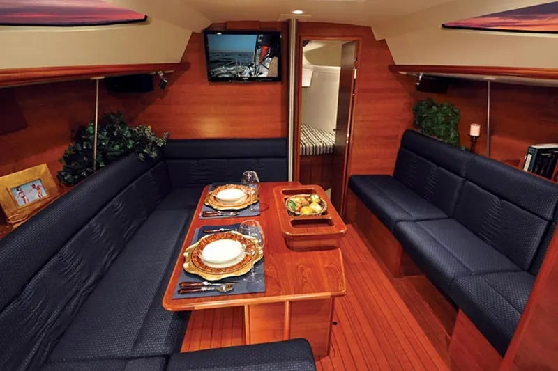 Slide: The Image of Interior of 2014 Marlow-Hunter 33 yacht with elegant dining area and cozy seating. - 30