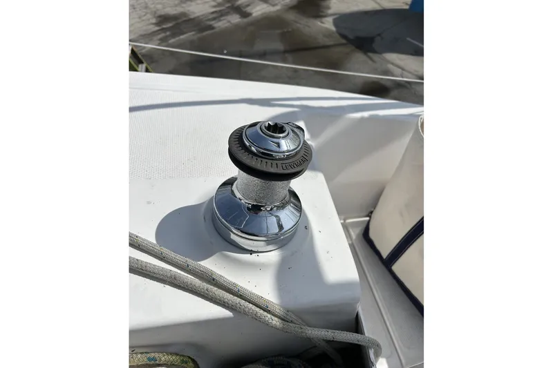 Slide: The Image of Winch on 2014 Hunter e33 sailboat deck with ropes. - 8