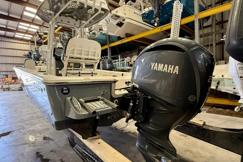 Slide: The Image of 2022 Tidewater 2300 Carolina Bay boat with Yamaha engine in storage facility. - 10