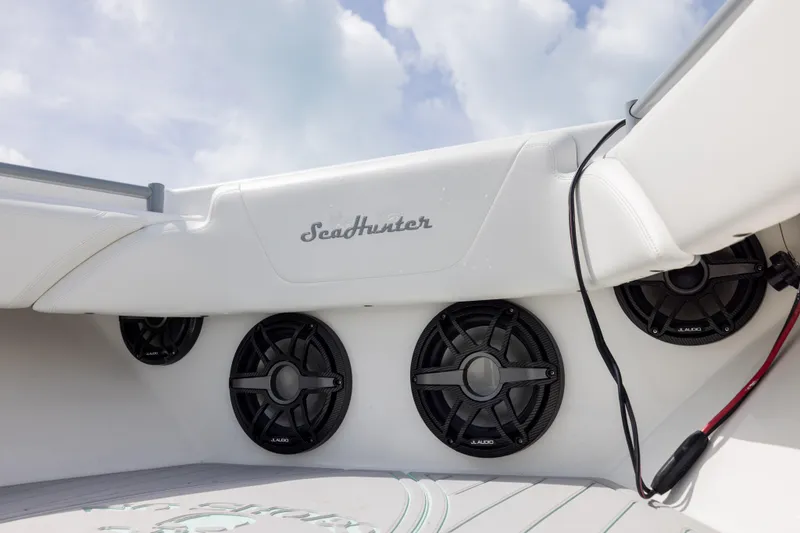 Slide: The Image of 2025 SeaHunter 30 Floridian boat interior with JL Audio speakers and sleek design. - 14