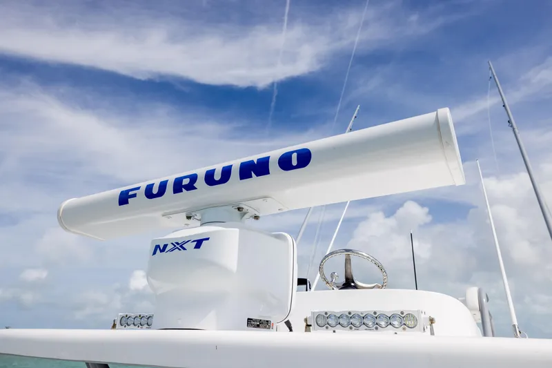 Slide: The Image of Radar system on 2025 SeaHunter 30 Floridian boat under blue sky. - 16