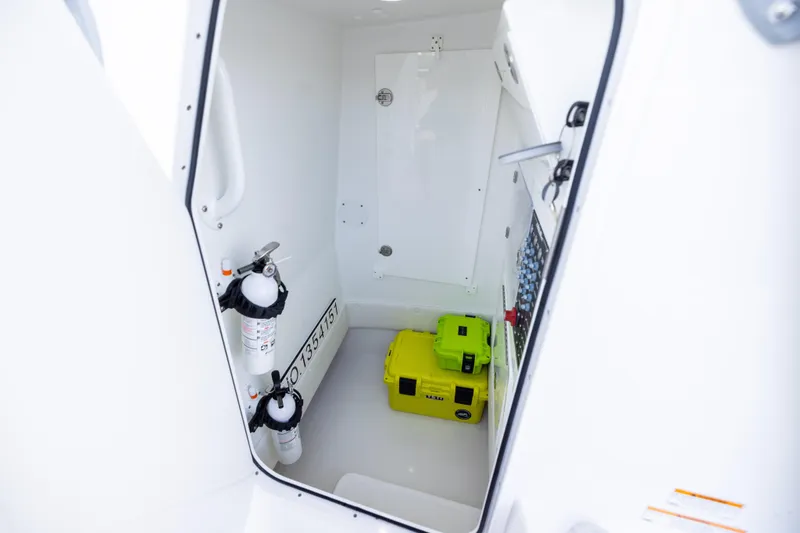 Slide: The Image of Interior of 2025 SeaHunter 30 Floridian boat with safety equipment and storage. - 21