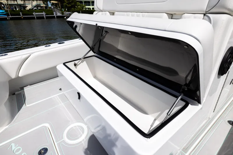 Slide: The Image of Open storage compartment on 2025 SeaHunter 30 Floridian boat, showcasing sleek design and functionality. - 32