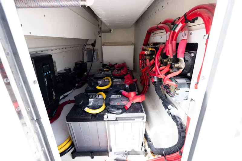 Slide: The Image of Electrical system of 2025 SeaHunter 30 Floridian boat, featuring batteries and wiring. - 35
