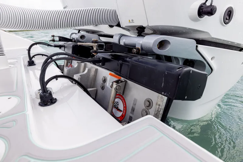 Slide: The Image of Close-up of 2025 SeaHunter 30 Floridian boat engine components on water. - 42
