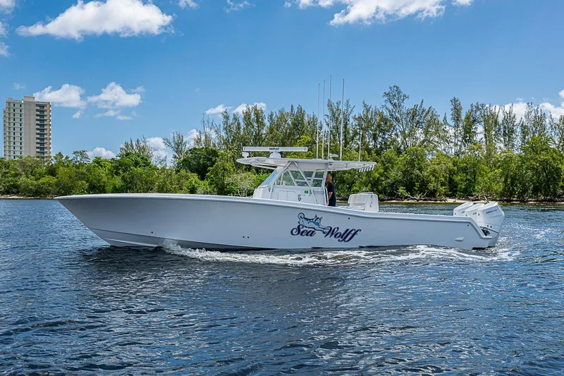 Slide: The Image of 2015 Invincible 42 Open Fisherman boat cruising on a sunny day. - 23