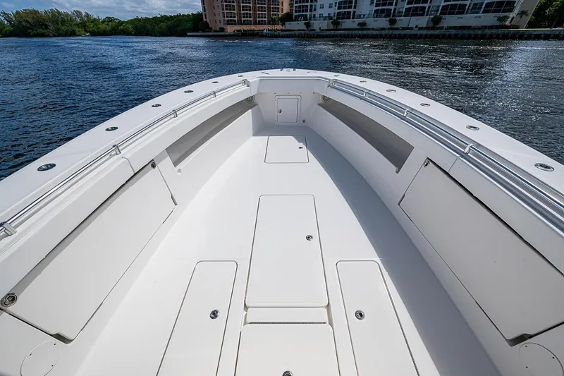 Slide: The Image of Bow view of 2015 Invincible 42 Open Fisherman boat on water. - 5