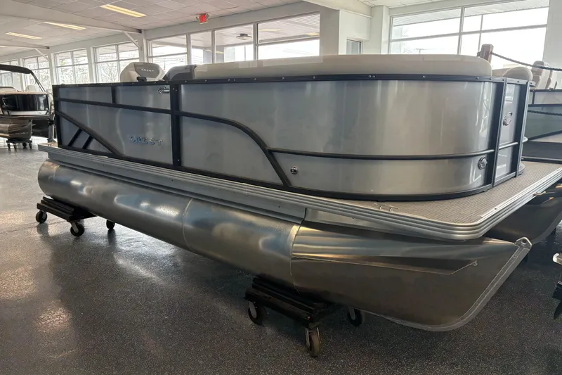 Slide: The Image of Crest 180 SE pontoon boat 2026 displayed in showroom. - 2