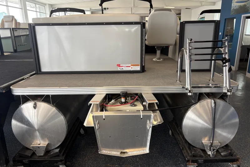 Slide: The Image of Interior view of 2026 Crest 180 SE boat cockpit with steering and instruments. - 3