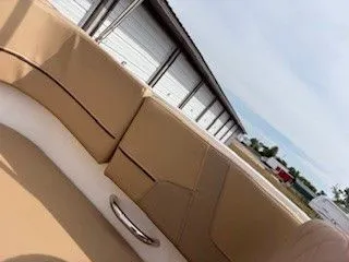 Slide: The Image of Interior of 2023 Bayliner VR5 Bowrider I/O with beige seating. - 0