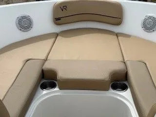 Slide: The Image of 2023 Bayliner VR5 Bowrider I/O, beige upholstery, speakers, cup holders. - 15