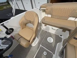 Slide: The Image of Interior of 2023 Bayliner VR5 Bowrider I/O with beige seating. - 7