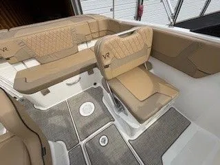 Slide: The Image of Interior of 2023 Bayliner VR5 Bowrider I/O with beige seating. - 8