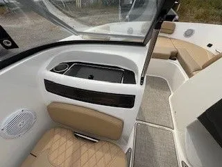 Slide: The Image of Interior of 2023 Bayliner VR5 Bowrider I/O with beige seating. - 9