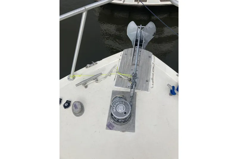 Slide: The Image of Bow of 1989 Topaz 44 Sportfisherman with anchor and Maxwell winch. - 30