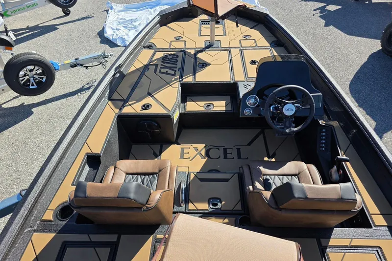 Slide: The Image of 2026 Excel EX 183 boat interior with steering wheel, seats, and deck design. - 13