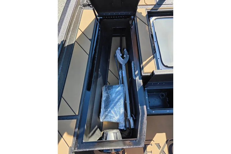 Slide: The Image of Storage compartment of 2026 Excel EX 183 boat with equipment inside. - 17