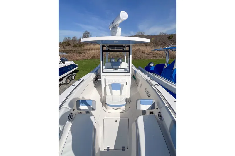 Slide: The Image of 2023 Robalo R270 Center Console boat with sleek design and spacious deck. - 15